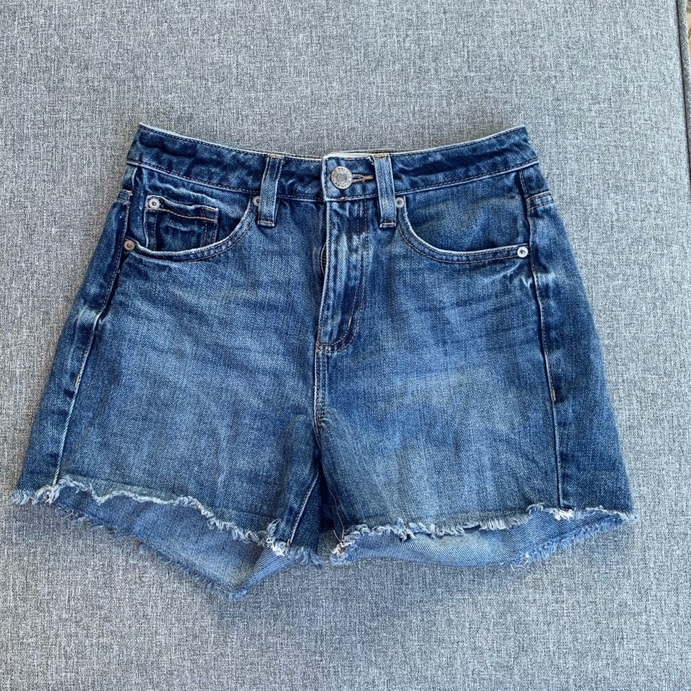 High-rise, mid-length mom jean shorts from Garage